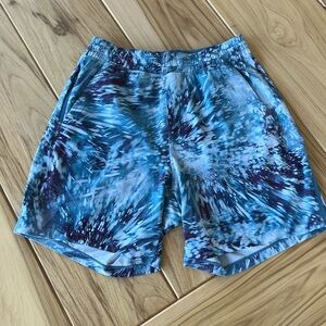 These are 7’ lulu lemon shorts. They are multi color with blues and white.